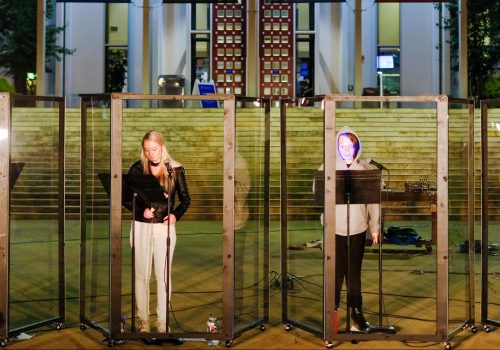 Students in front of the library during the Pandemic Theater performance